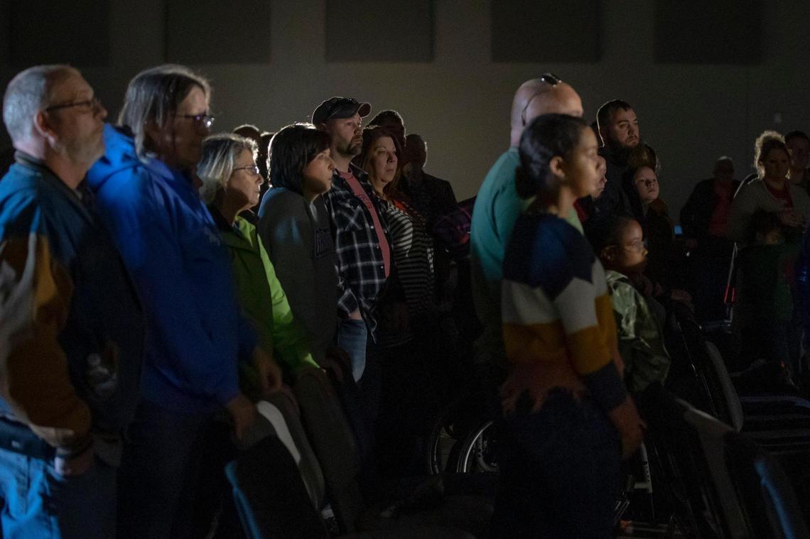 People attend a worship service at His House Ministries in Mayfield, Ky., on Sunday, Dec. 12, 2021.