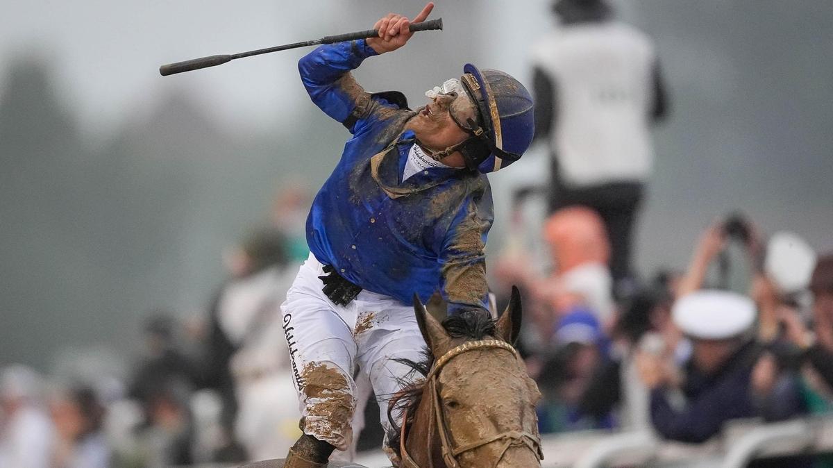 Jockey Junior Alvarado, aboard Sovereignty, celebrates after winning the 151st running of the Kentucky Derby, at Churchill Down, in Louisville, Kentucky, Saturday, May 3, 2025.