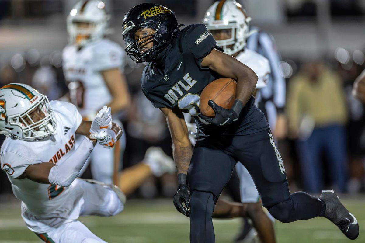 Boyle County’s Demauriah Brown (0) runs the ball 46 yards for a touchdown against Frederick Douglass at Boyle County High School in Danville on Friday.