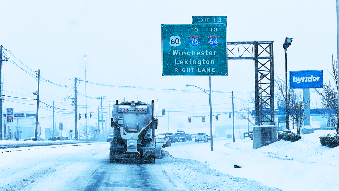 A city salt truck moves snow and lays salt at exit 13 in Lexington, KY, on January 5, 2025.