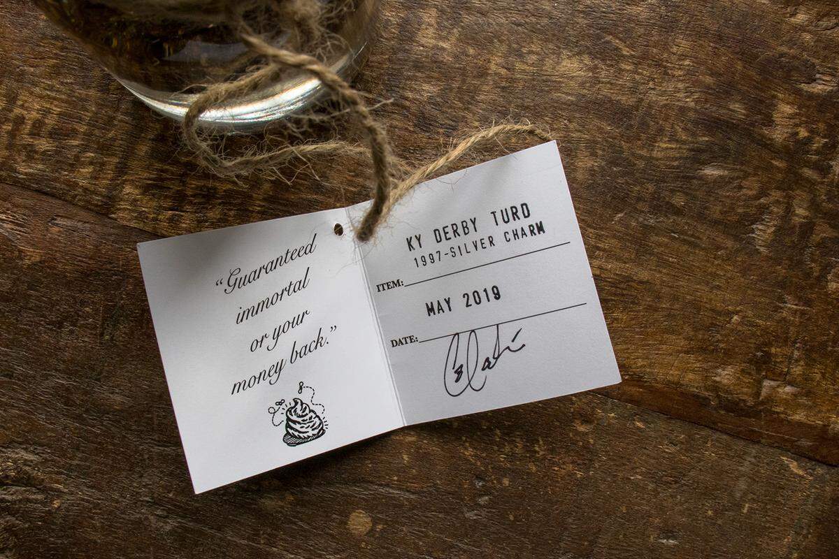 Each jar, created by artist Coleman Larkin, comes with a card authenticating the contents as a genuine “Ky Derby Turd.”