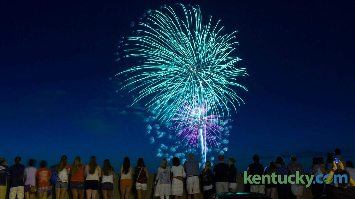 A crowd gathered on the top floor of a parking structure on Broadway near High Street to watch the downtown fireworks on July 4.