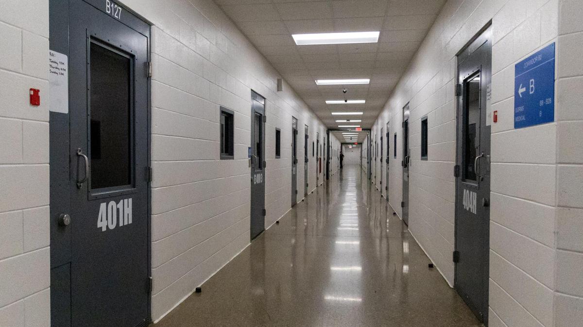 A corridor with multiple rooms housing several inmates within Laurel County Correctional Center in London, October 29, 2024.