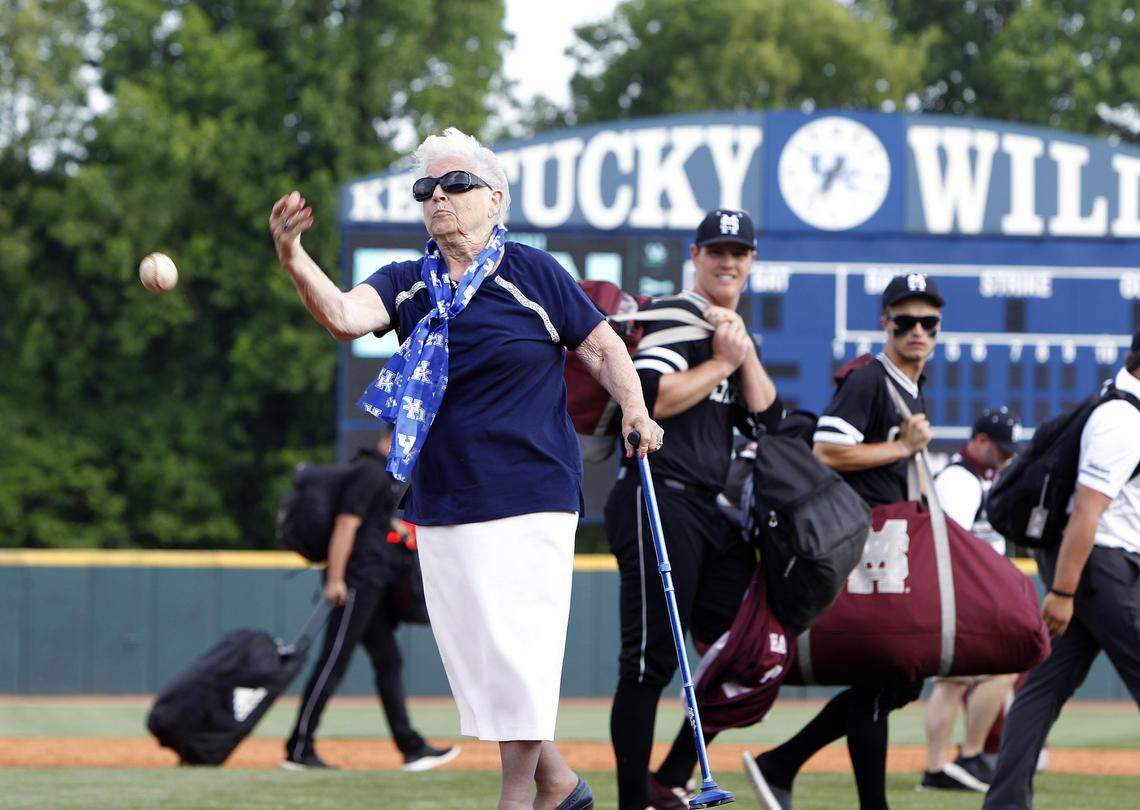 Fans of all ages took turns throwing a ceremonial last pitch as Mississippi State players watched Sunday following the final regular-season game played at Cliff Hagan Stadium.