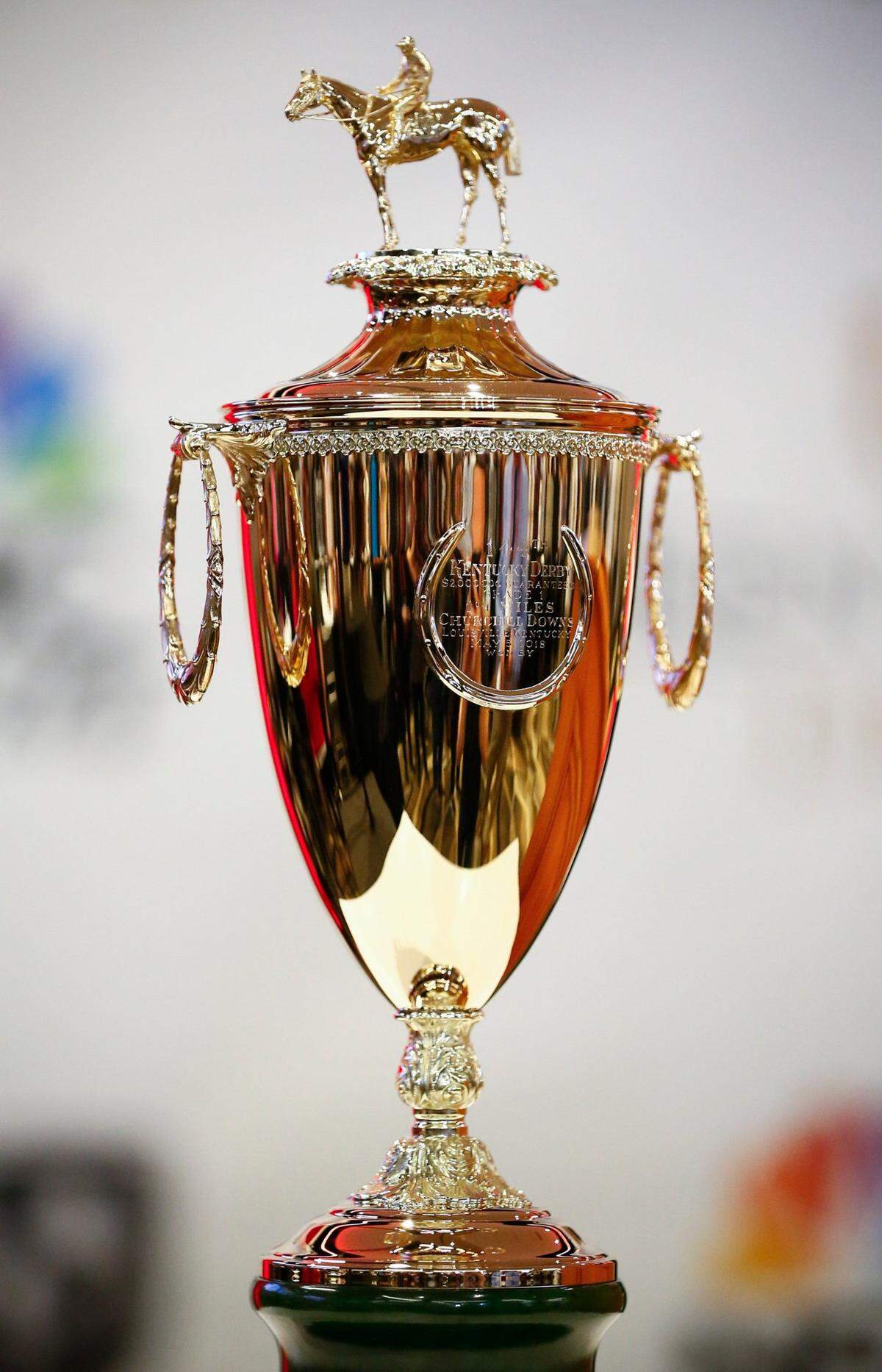 A Kentucky Derby trophy sat before the post position draw for the 144th running of the Kentucky Derby Tuesday in the Aristides Lounge at Churchill Downs.