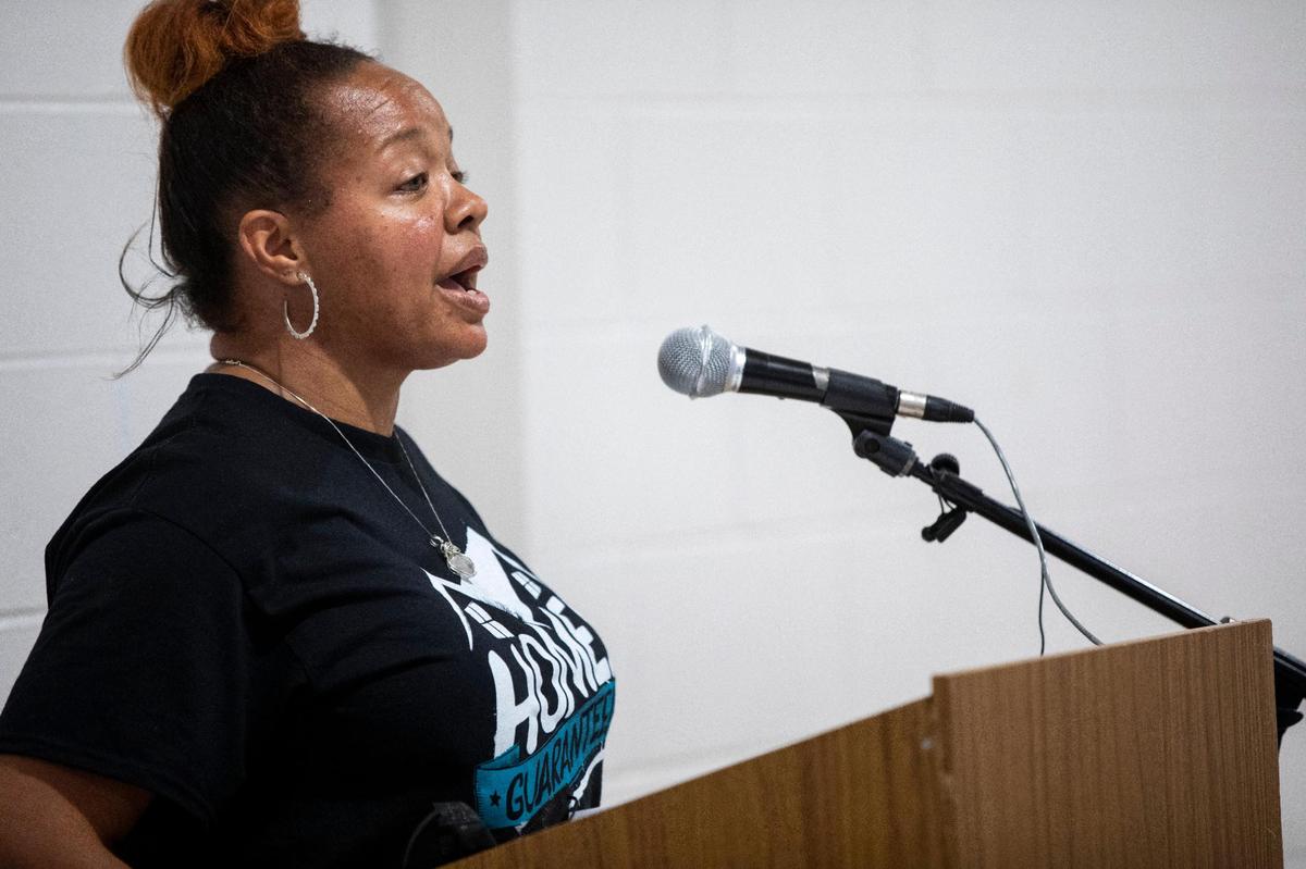 Davita Gatewood, a single mother of six who is facing eviction and who traveled to D.C. this week to ask the Biden administration to increase tenant protections, speaks during town hall meeting organized by KY Tenants Union at the Lyric Theatre in Lexington, Ky., Friday, July 22, 2022.