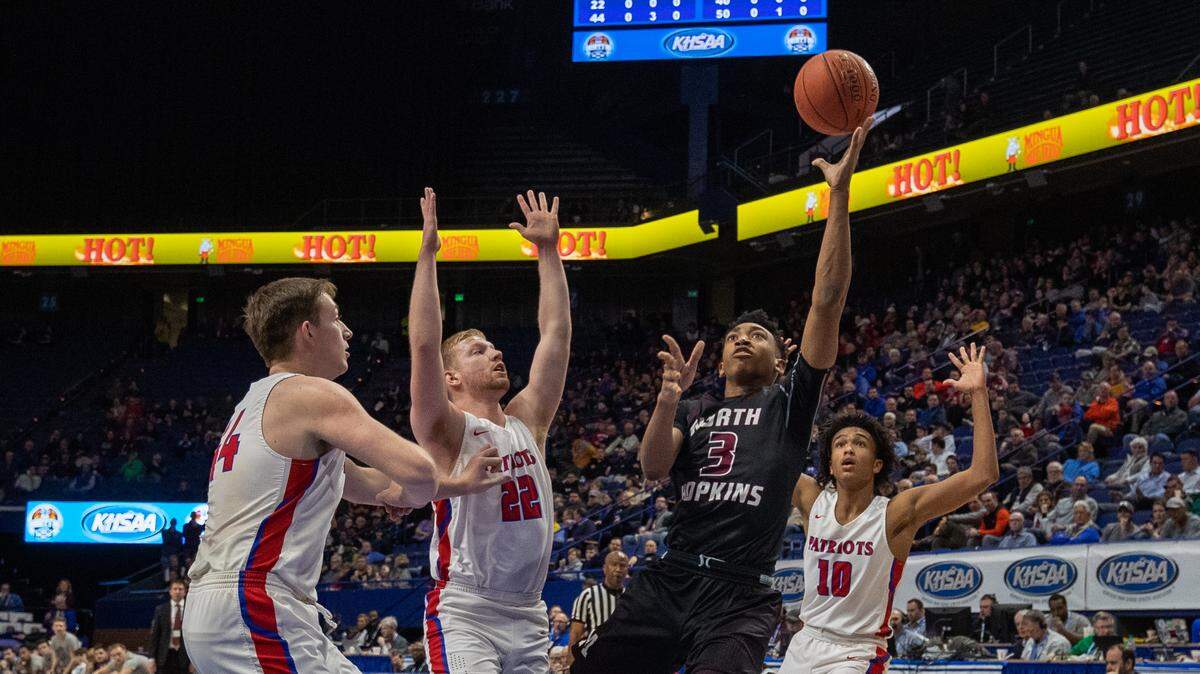 Madisonville’s Kenny White (3) put up a shot against Lincoln County during the first round of the Sweet Sixteen on March 7, 2019.