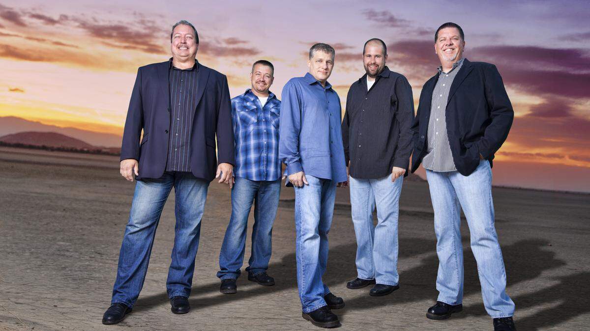 Russell Moore and IIIrd Tyme Out — Wayne Benson, left, Moore, Justen Haynes, Edgar Loudermilk and Steve Dilling — play two shows Saturday in Clay City.    