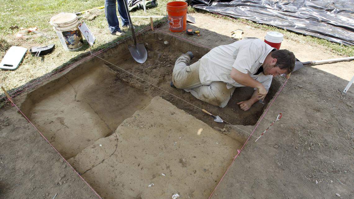 Donald Handshoe used a trowel Wednesday at the site of an archaeological dig at Fort Boonesborough State Park. University of Kentucky archaeologists were seeking historical evidence of the fort's footprint and where its walls stood, a quarter mile from today's re-created fort.    