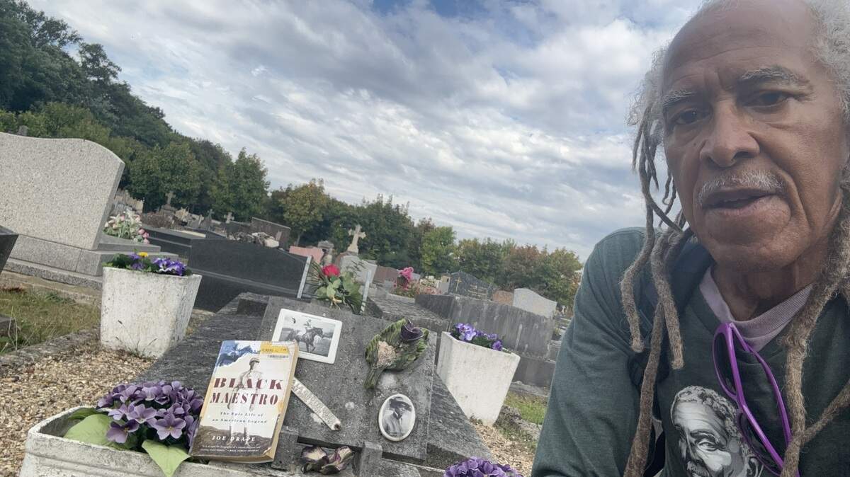 Jim Embry left a copy of Joe Drape’s biography of jockey Jimmy Winkfield at his family resting place outside of Paris, France.