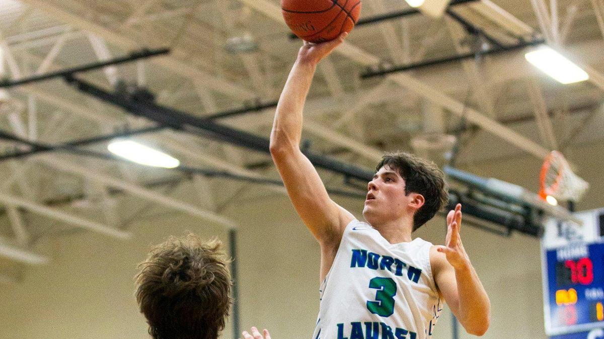 North Laurel’s Reed Sheppard (3) scored in the fourth quarter of the North Laurel vs Pleasure Ridge Park boy’s basketball game at the WGM Holiday Classic Tournament at Lexington Catholic High School in Lexington, Ky. on Dec. 27, 2021. North Laurel beat Pleasure Ridge Park 100-94 in overtime. Photo by Pablo Alcala