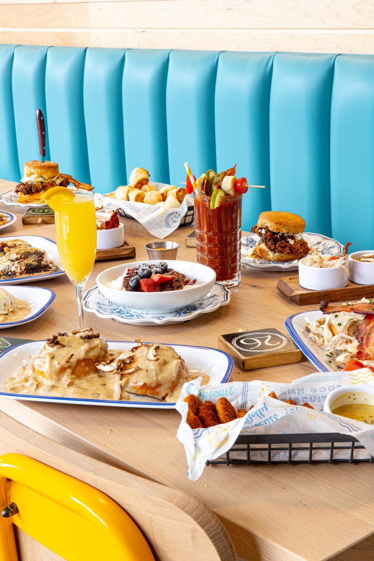 Biscuit Belly features gourmet biscuits sandwiching a wide variety of ingredients including buttermilk fried chicken thighs or smoked brisket.