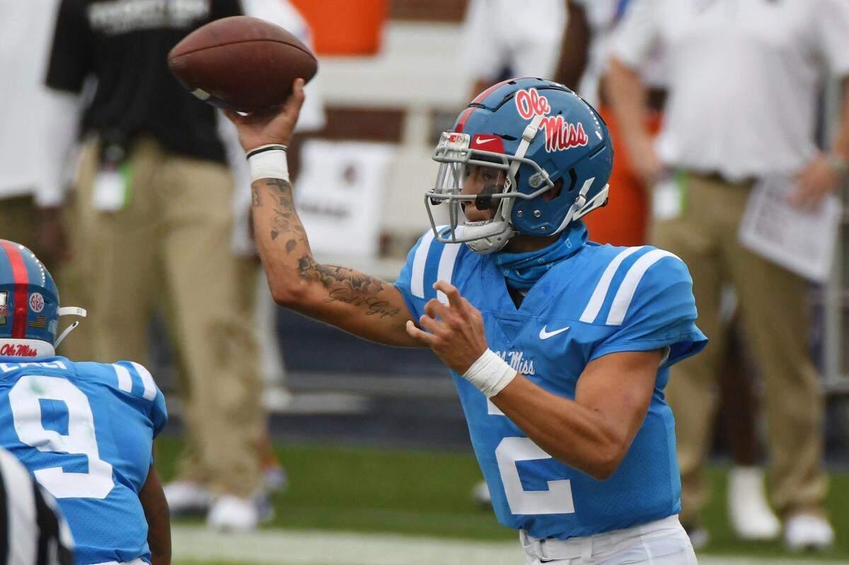 Mississippi quarterback Matt Corral (2) made the decision by new Rebels Coach Lane Kiffin to start him in the season opener vs. Florida look good by throwing for 395 yards and three touchdowns in a 51-35 loss.