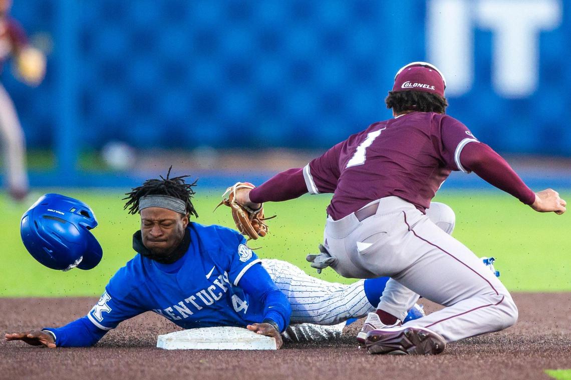 Kentucky Wildcats infielder Zeke Lewis (4) steals second base avoiding a tag from Eastern Kentucky Colonels Daniel Harris (1) at Kentucky Proud Park in Lexington Ky., Tuesday, March 2, 2021.