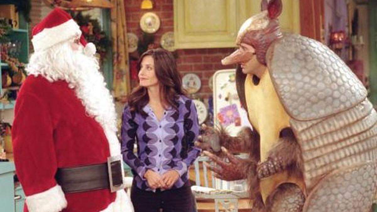 Matthew Perry, left, Courteney Cox and David Schwimmer in the Friends episode "The One with the Holiday Armadillo."    