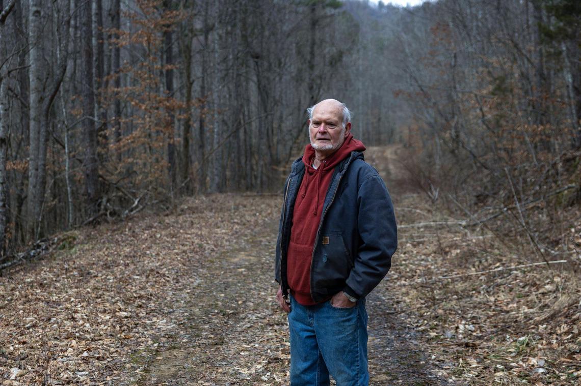 Phillip Johnson is photographed on his property in Pike County, Ky., on Tuesday, 18, 2025. Water rushing off a nearby surface coal mine that wasn’t fully reclaimed has rutted out the road to Johnson’s cabin in Pike County, Ky. It’s now been more than two years since he has been able to visit cabin.