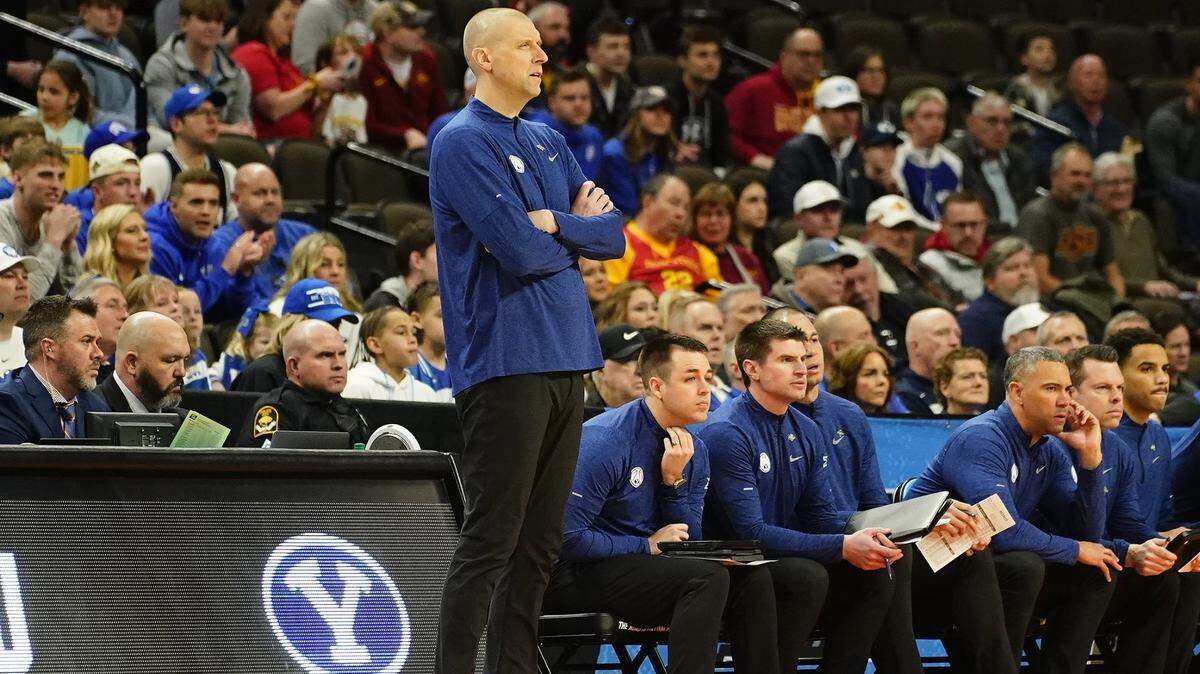 What is Mark Pope’s history as a college basketball head coach in the NCAA Tournament?