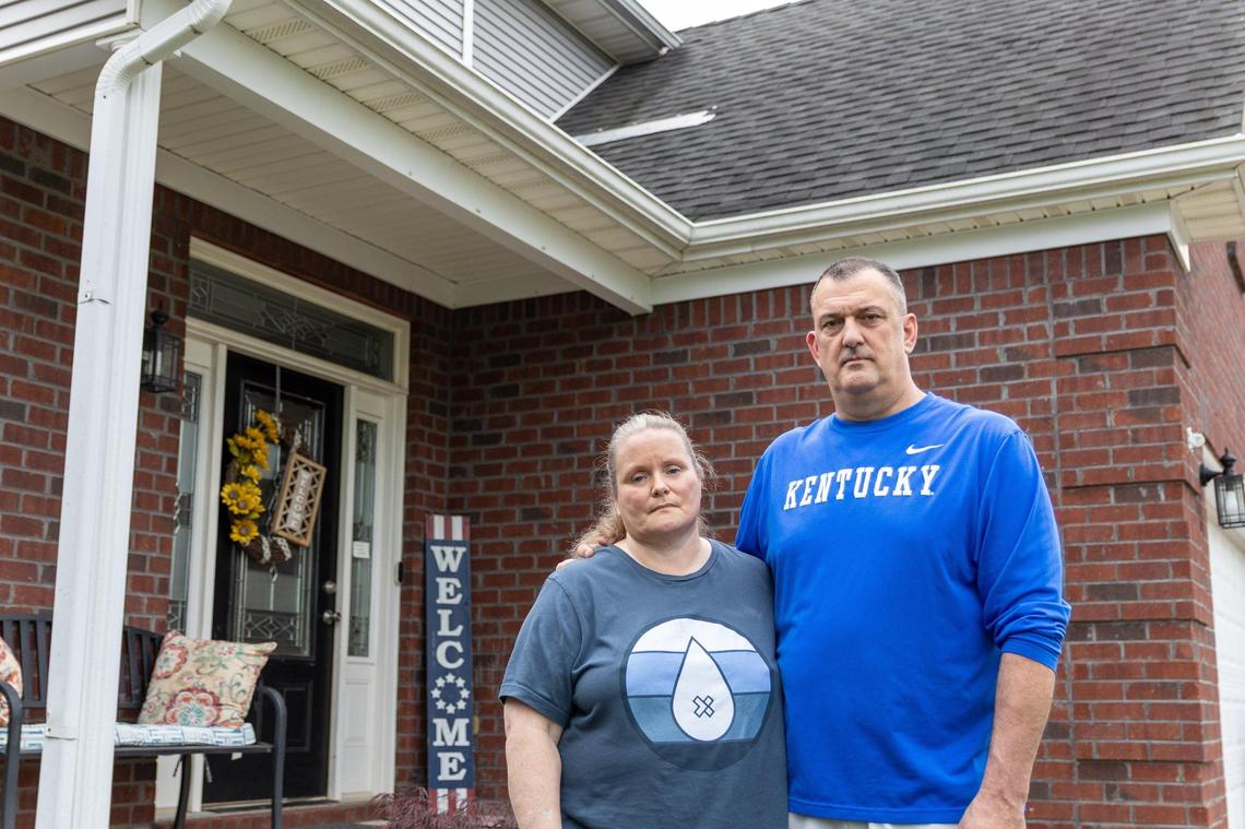 Homeowner Tammy Books, left, and her husband Steven, right, paid almost $9,000 for roof repairs by Lexington Blue, but the company never came. Lexington Blue later went out of business before they could get a refund. May 13, 2025.