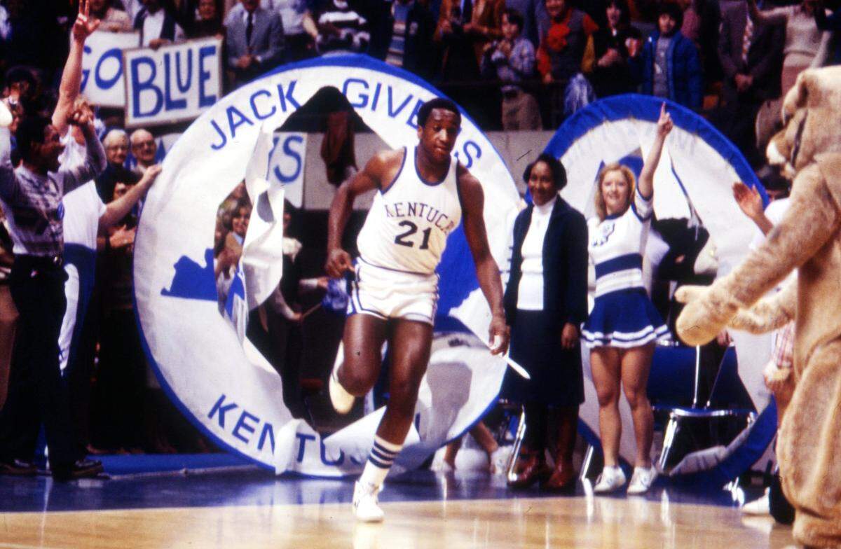 Jack Givens runs onto the Rupp Arena floor during Senior Day activities on March 4, 1978.