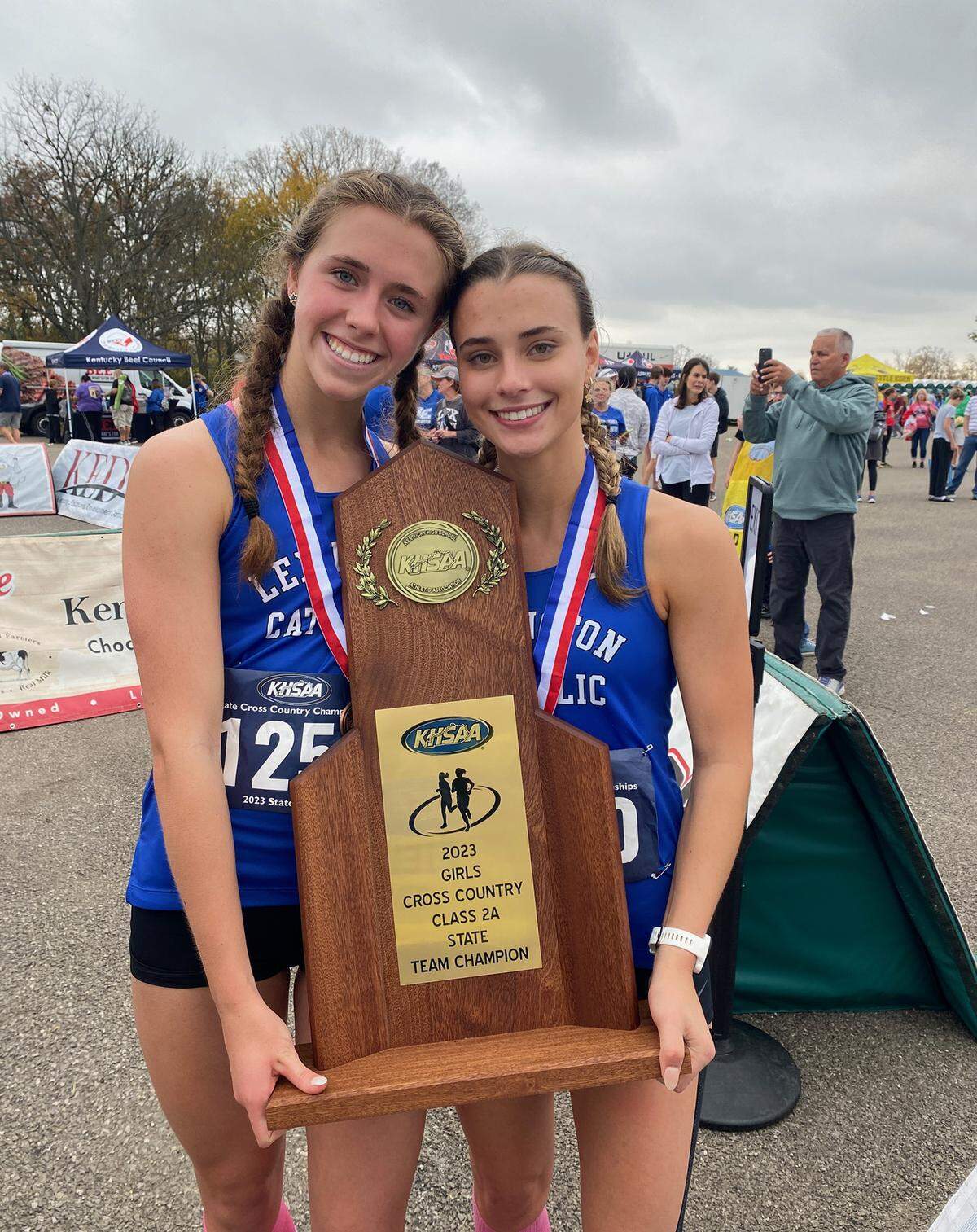 Caroline Beiting, left, and Cate Conklin helped lead Lexington Catholic’s girls to their third straight state championship.