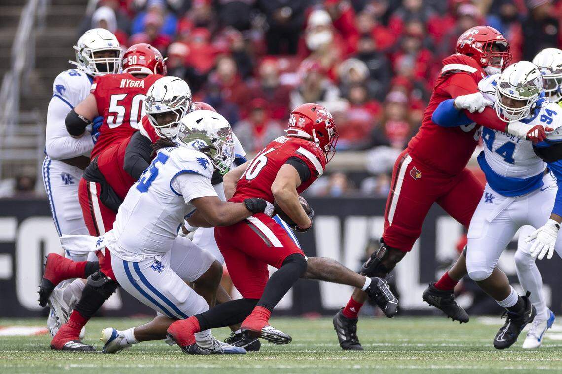 Louisville running back Braxton Jennings (46), a true freshman walk-on from Ashland, ran for 113 yards to help U of L crush UK 41-0.