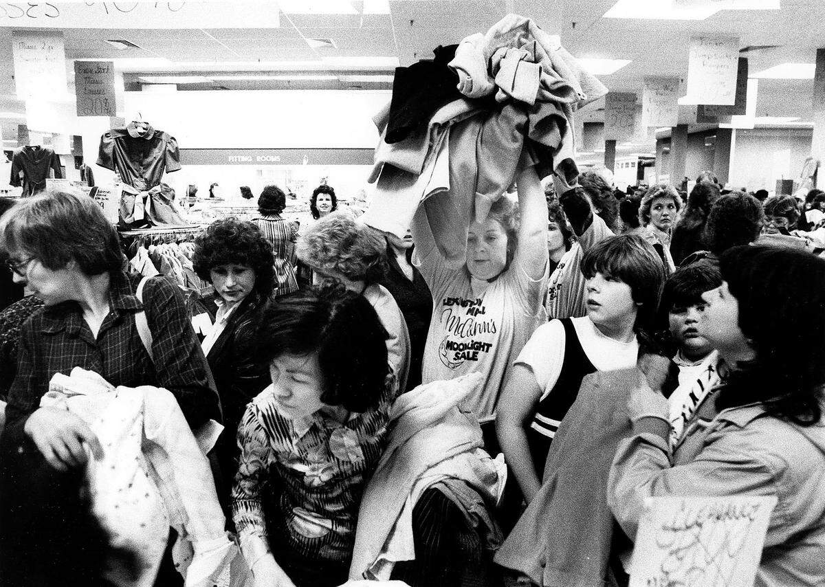 When the crowd at Lexington Mall’s McAlpin’s hollered during a Moonlight Madness sale for more clothes at discount prices of $1 and $2, Lolene Dawkins came to the rescue April 10, 1984. She would take clothes from another table and throw them over the heads of unsuspecting shoppers. The spring Moonlight Madness sale was the second-highest day in volume for the Lexington Mall and Turfland Mall McAlpin’s stores – the fall Madness sales produced the highest volume. McAlpin’s theory behind the “Madness”? Low prices bring high sales volume, and hence profits. In 1998, Dillard’s bought McAlpin’s.
