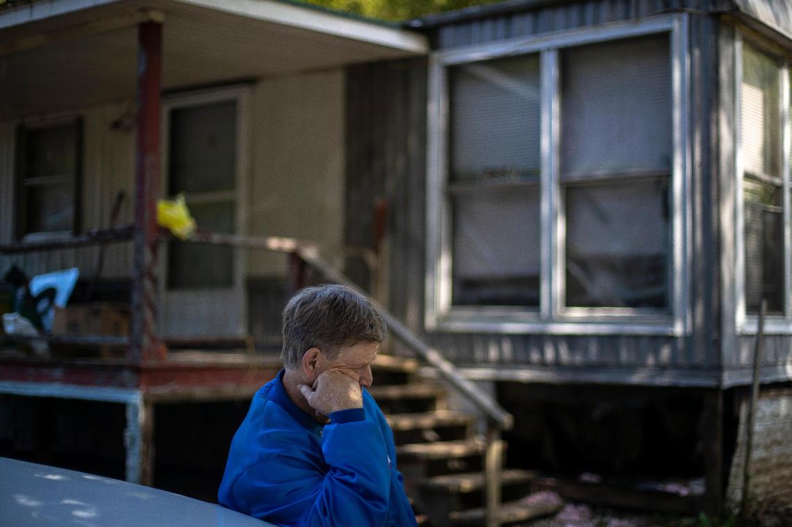 Michael Miller is photographed outside his home in Eastern Kentucky on Monday, Sept. 26, 2022. Miller’s home was damaged by flooding last summer.