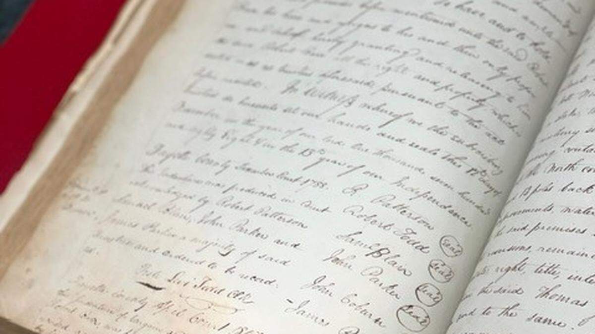 A deed book from the Fayette County Clerk’s office. The office, along with the University of Kentucky, recently digitized some of Lexington’s earliest paper records, which includes slave and land records.