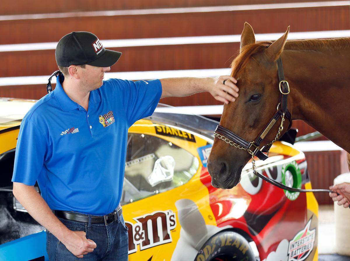 NASCAR star Kyle Busch petted 2003 Kentucky Derby winner Funny Cide on a 2017 visit to the Kentucky Horse Park. Busch was there to promote the 2017 Quaker State 400 at Kentucky Speedway. Busch, who won seven NASCAR-sanctioned races at Kentucky Speedway over his career, died unexpectedly last week at age 41.