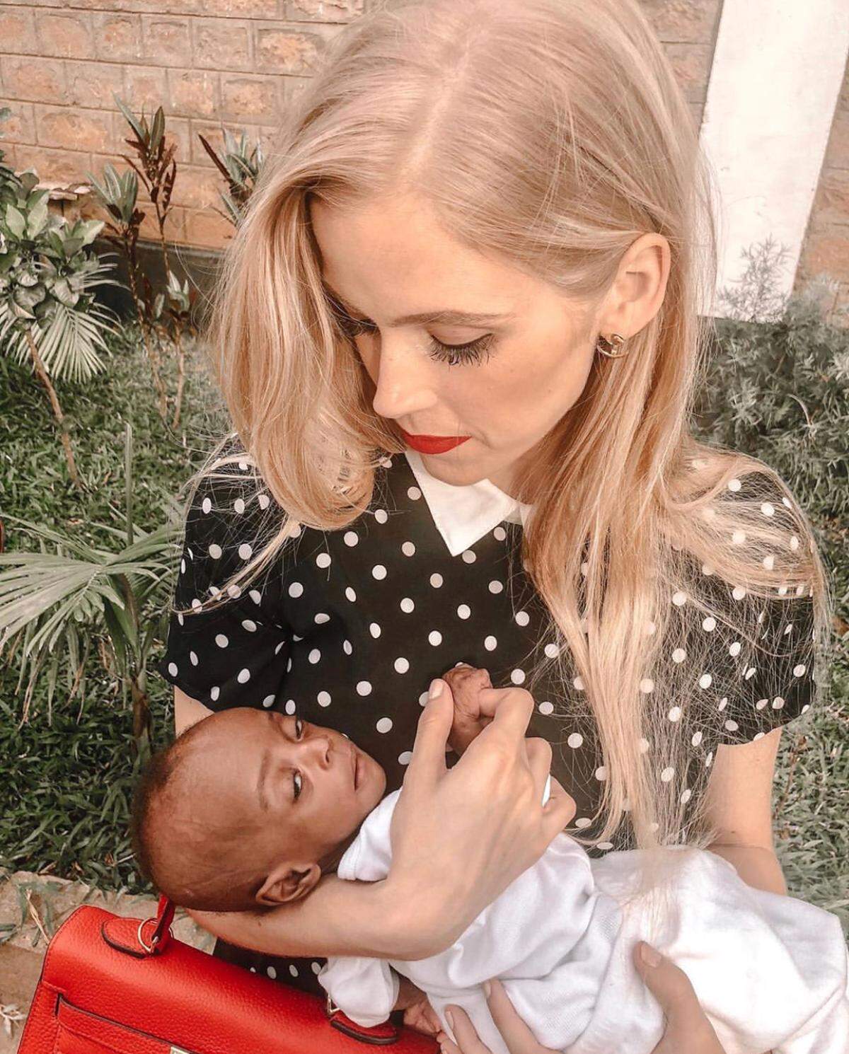 Amy Hehre, a Somerset native and physicians assistant, held a tiny patient. She and her husband founded OVI Children’s Hospital in Migori, Kenya.