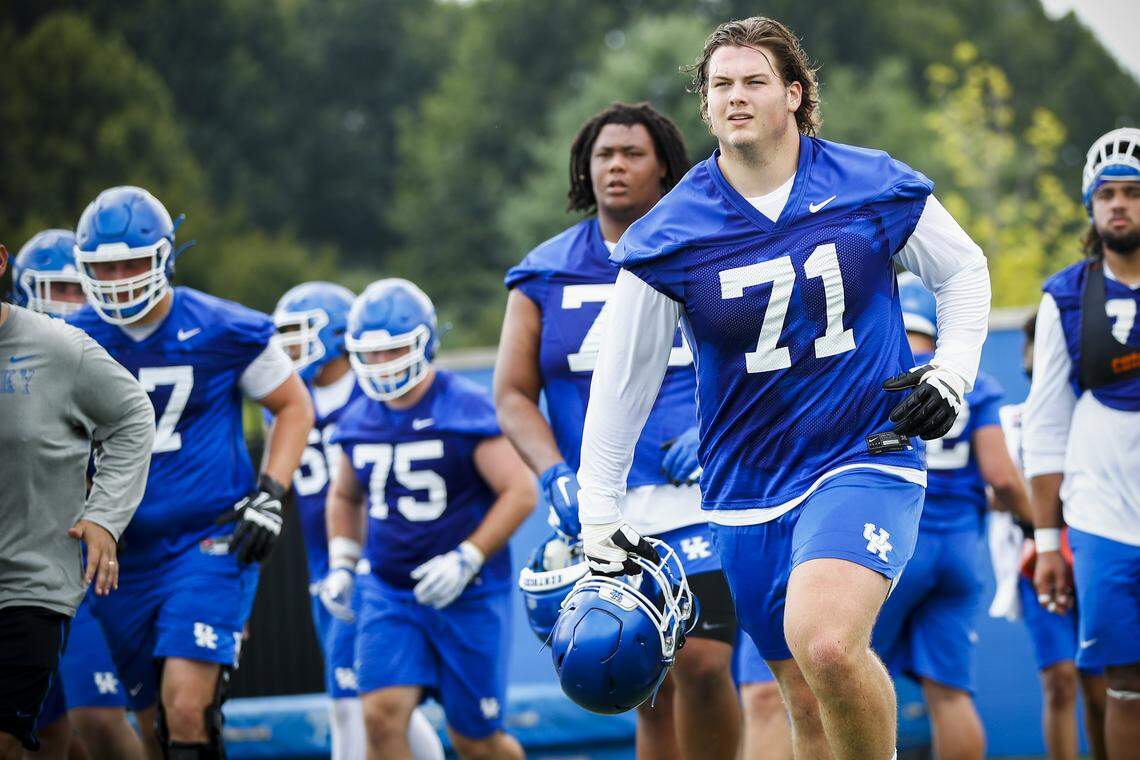 Kentucky offensive guard Logan Stenberg (71) says of growing up the youngest of four brothers: “I really credit them with my toughness.”