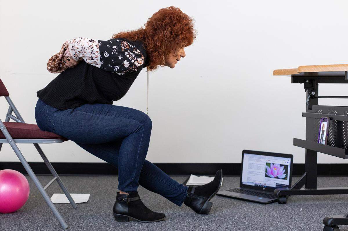 Health Educator Mary Beth Castle, conducts her weekly gentle chair yoga classes over Facebook live at the Johnson County Public Health Department in Paintsville.
