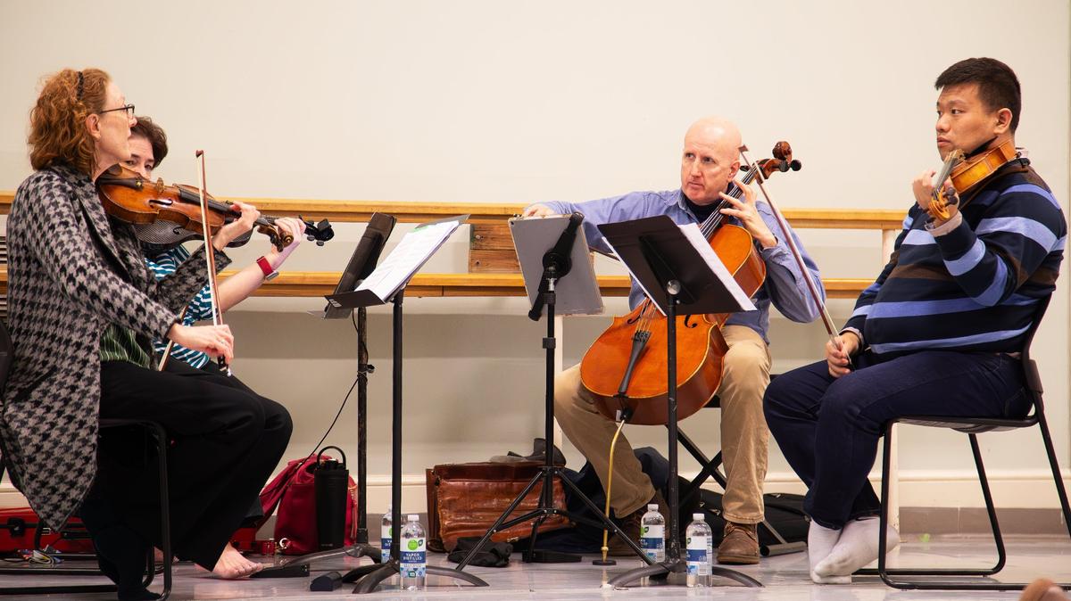 Lexington Philharmonic string quartet rehearses routines with the Lexington Ballet ahead of a special performance together.