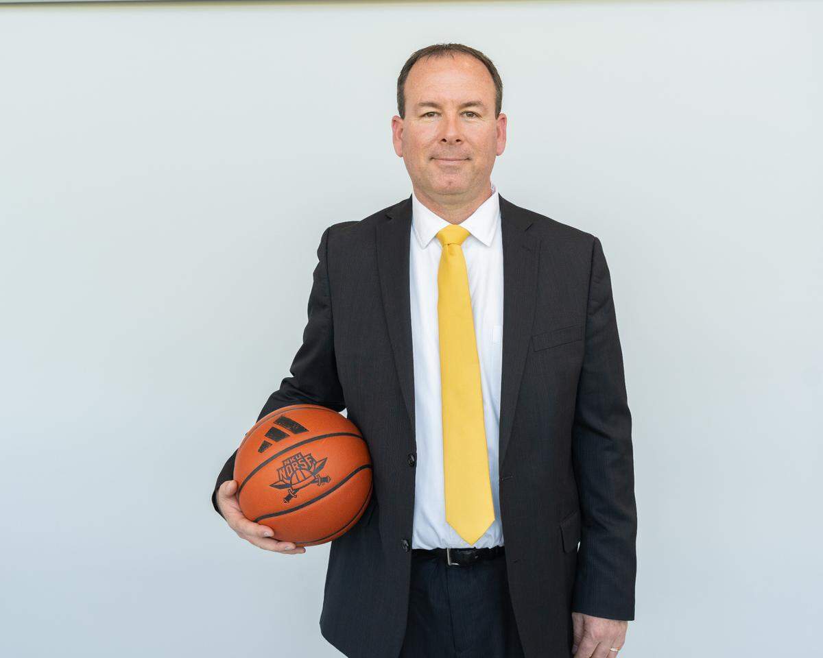 New Northern Kentucky University women’s basketball coach Jeff Hans went 339-42 in 13 seasons as Thomas More University women’s hoops coach. Prior to breaking into college coaching, Hans went 59-9 in two years leading the Lexington Catholic girls basketball program.
