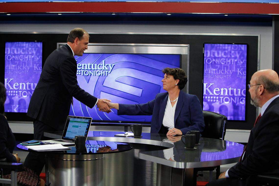 Incumbent Rep. Andy Barr, R-Ky., shook hands with Democrat candidate Lt. Col. Amy McGrath prior to debating with Libertarian Frank Harris on KET. Photo by Matt Goins