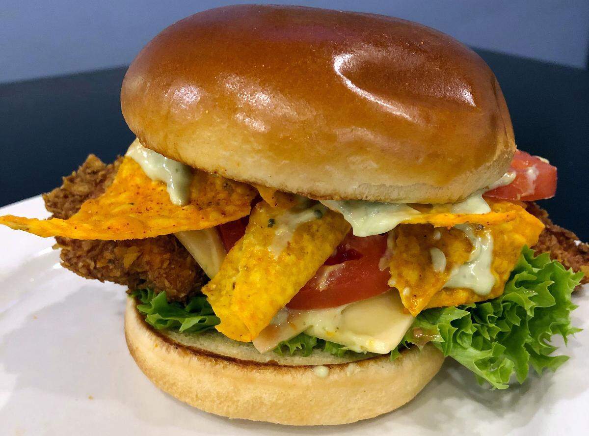 The nacho-cheese-Dorito-crusted fried chicken sandwich from Lexington Diner.