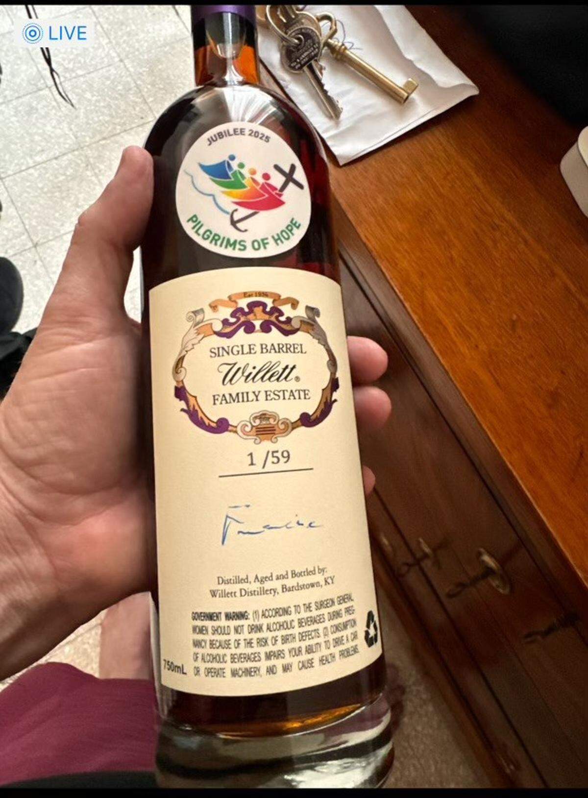Pope Francis’ signature on a bottle of Willett bourbon that will be auctioned by Sotheby’s to raise money for Father Jim Sichko’s ministry and other charities.
