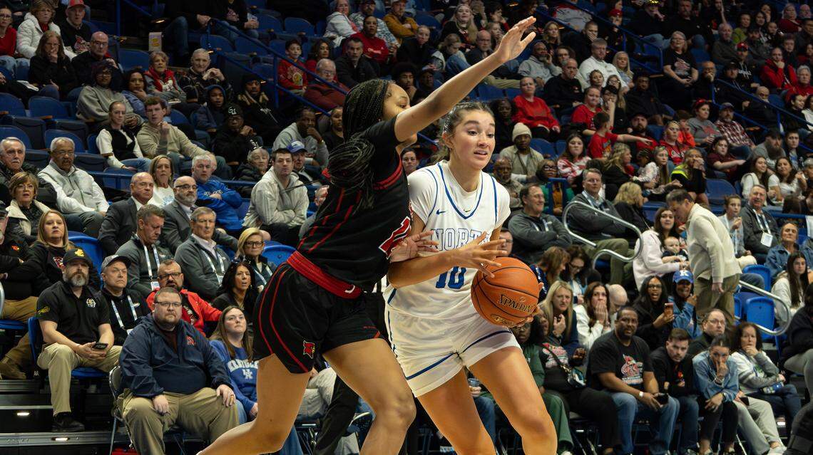 North Laurel's Mariella Claybrook attempts the two-points, failing to move past GRC's Jylin Edmonson during the 2026 Clark's Pump-N-Shop Girls' Basketball Sweet 16 state tournament first-round game between George Rogers Clark and North Laurel at Rupp Arena on March 12, 2026, in Lexington, Ky.