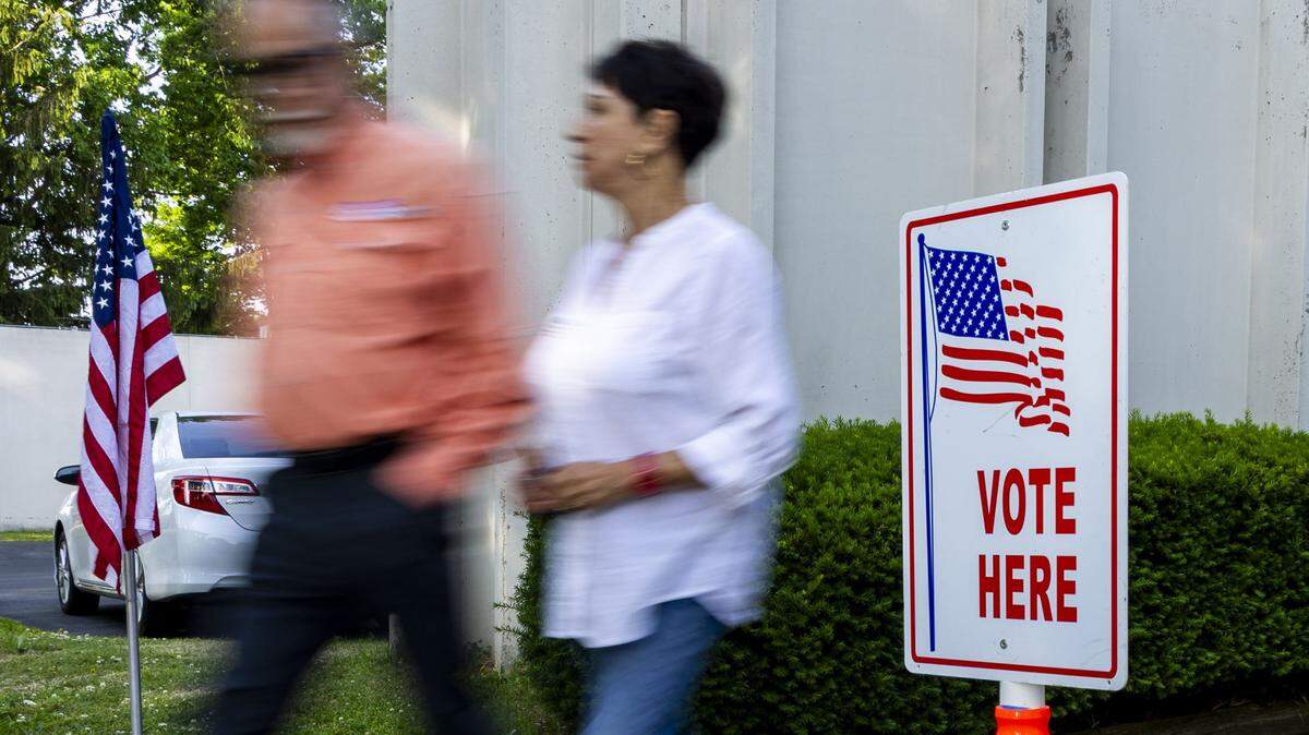 Voters leave after casting their ballots in the 2026 primary election at Julius Marks Elementary School, May 19, 2026, in Lexington, Ky. Voters went the polls on primary election day across Kentucky to decide who will be on the ballot in November for major races across the commonwealth.