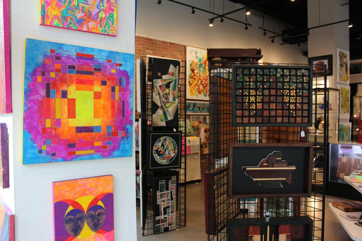 Art hangs on the walls of the ArtHouse Kentucky gallery in Lexington, Kentucky on Monday, Nov. 18, 2024