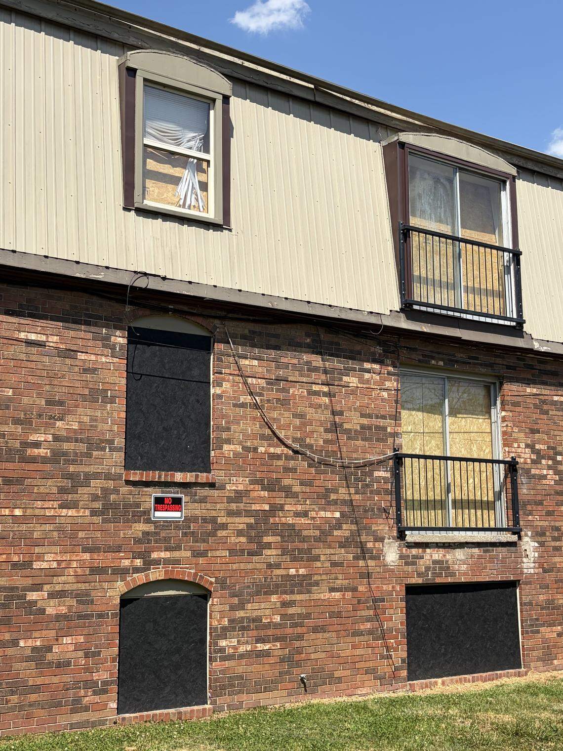 An apartment complex in southwest Lexington sits condemned and boarded up to prevent squatters from entering the residence.