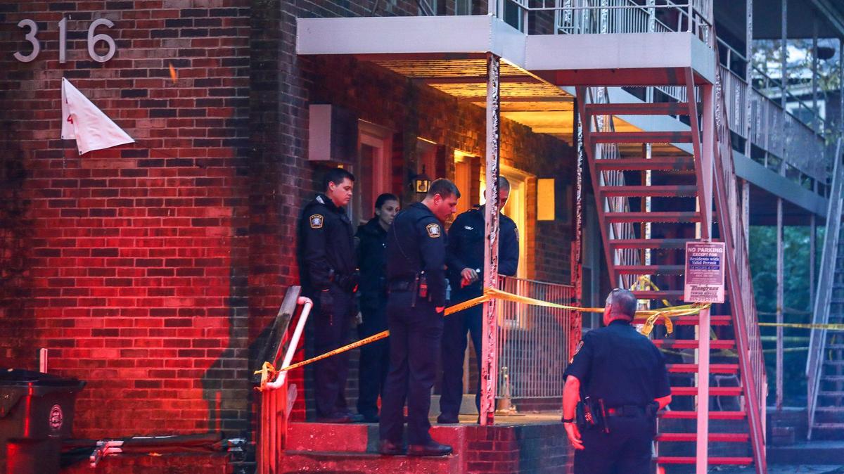 Police respond to the report of a shooting at 316 Rose Street in Lexington, Ky., Thursday, Nov. 7, 2019.