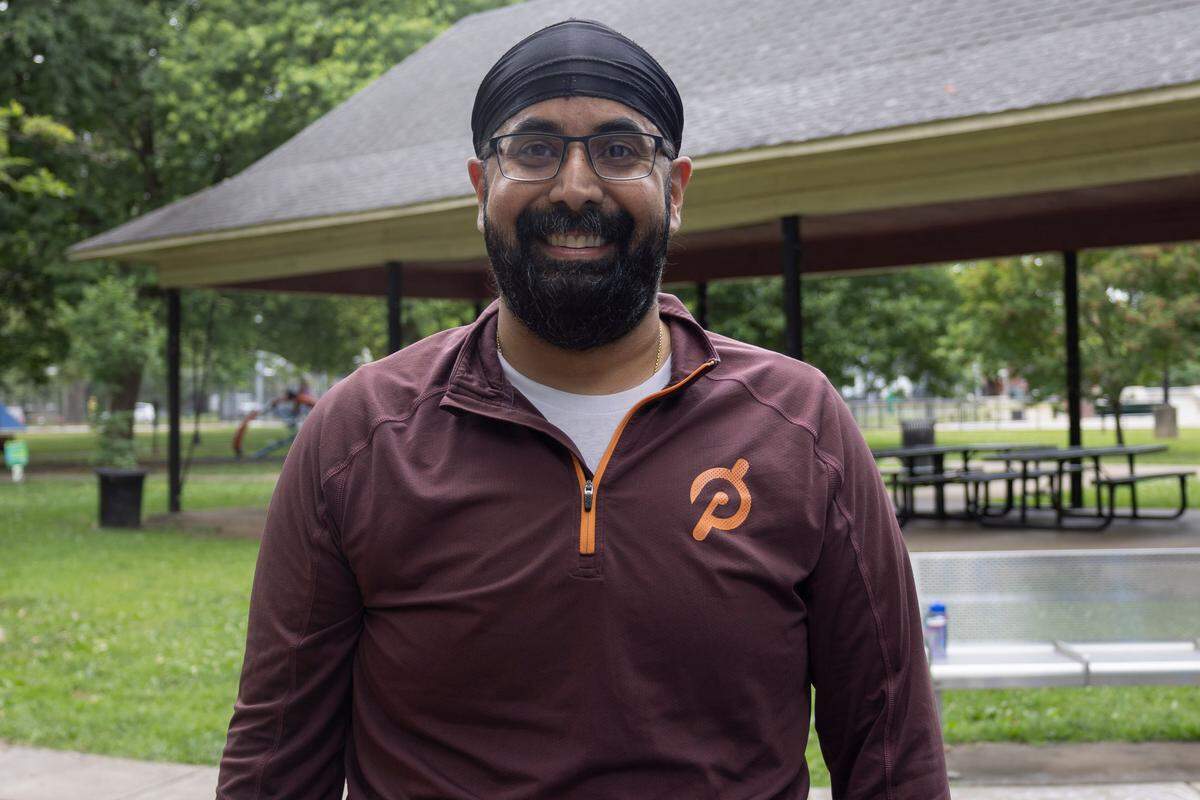 Rajvir Datta, a 42-year-old Fairway resident, poses for a photo at Woodland Park in Lexington, Kentucky on June 19, 2024.