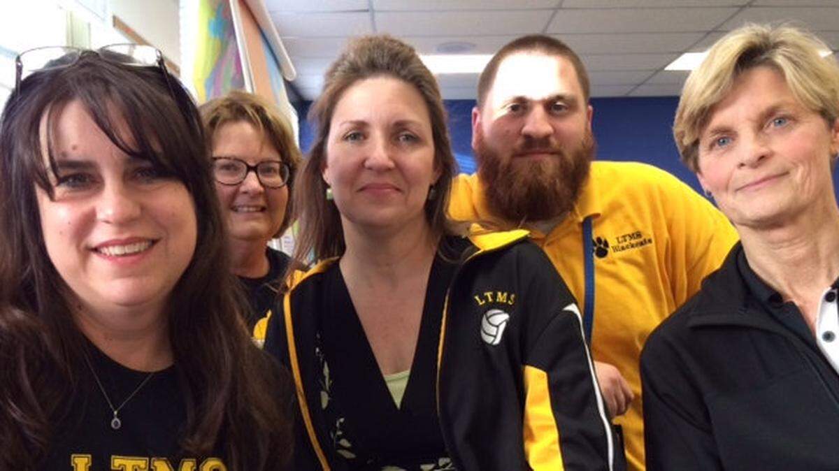 Lexington Traditional Magnet Middle School teachers Cindy Brown, left, Sharon Perry, Cheryl Gregoire, Chadwick Spencer and Barbara Spitz attended Tuesday's Fayette redistricting meeting.