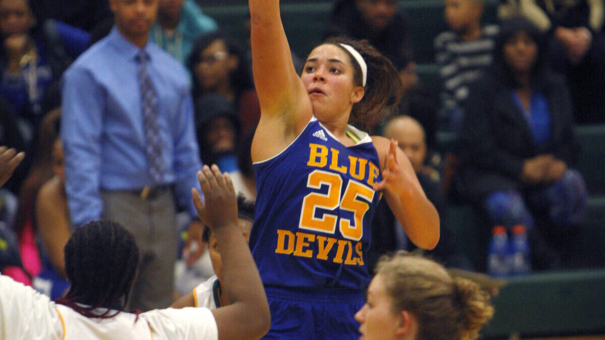 Henry Clay's Kerrigan Davis attempted a shot during the second half against Bryan Station on Tuesday night. Davis led the Blue Devils with 11 points.  