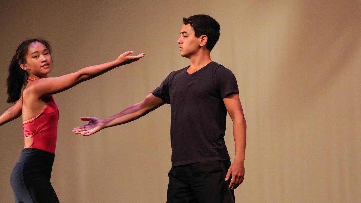 Lindsey Long and Angelito Anacan rehearse for the Saturday performance. The dance company, headed by Jeana Klevene, features contemporary dance rather than classical ballet.