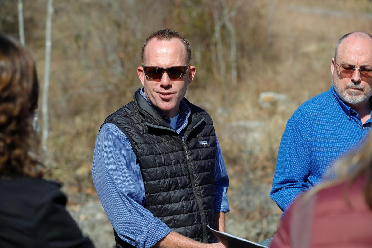 Nate Sandvig, left, and Michael Grambrel visit a former coal mine in Bell County, Ky., where Sandvig’s company is seeking to develop a hydropower storage pump project. Water would be released from an upper reservoir and turn hydroelectric turbines, generating electricity, on its way to a lower reservoir, where it’d then be pumped to the upper reservoir again to repeat the journey. Tuesday, March 1, 2022