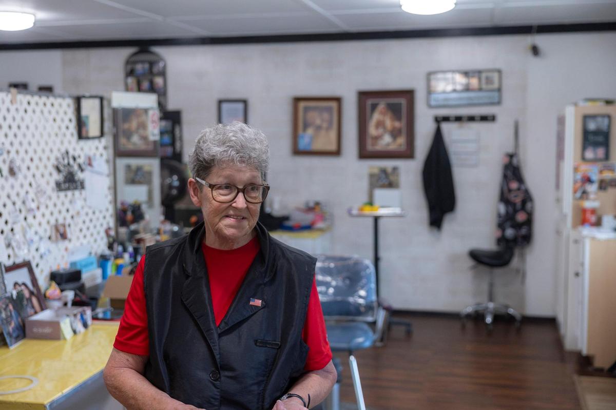 Phyllis Clemons, photographed at her work at Wayne’s Beauty Shop, lives down the road from where the wild horses roam in Breathitt County, Ky. “I feel so sorry for them,” she said. “Now there’s so many of them, I can’t have a garden.”