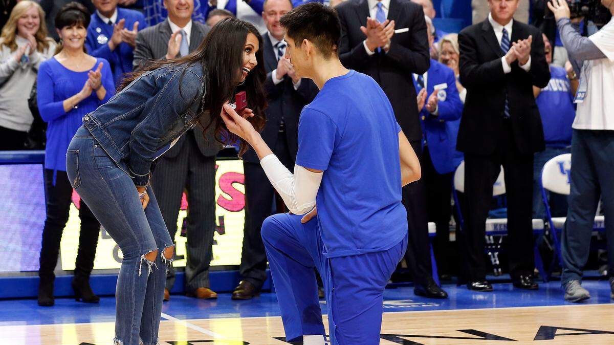 Kentucky’s Derek Willis proposed to his girlfriend Keely Potts during Senior Day activities at Rupp Arena on Feb. 28, 2017. Willis and Potts were married Saturday and their first dance together was to a song sung by Willis’ former UK teammate Isaac Humphries.