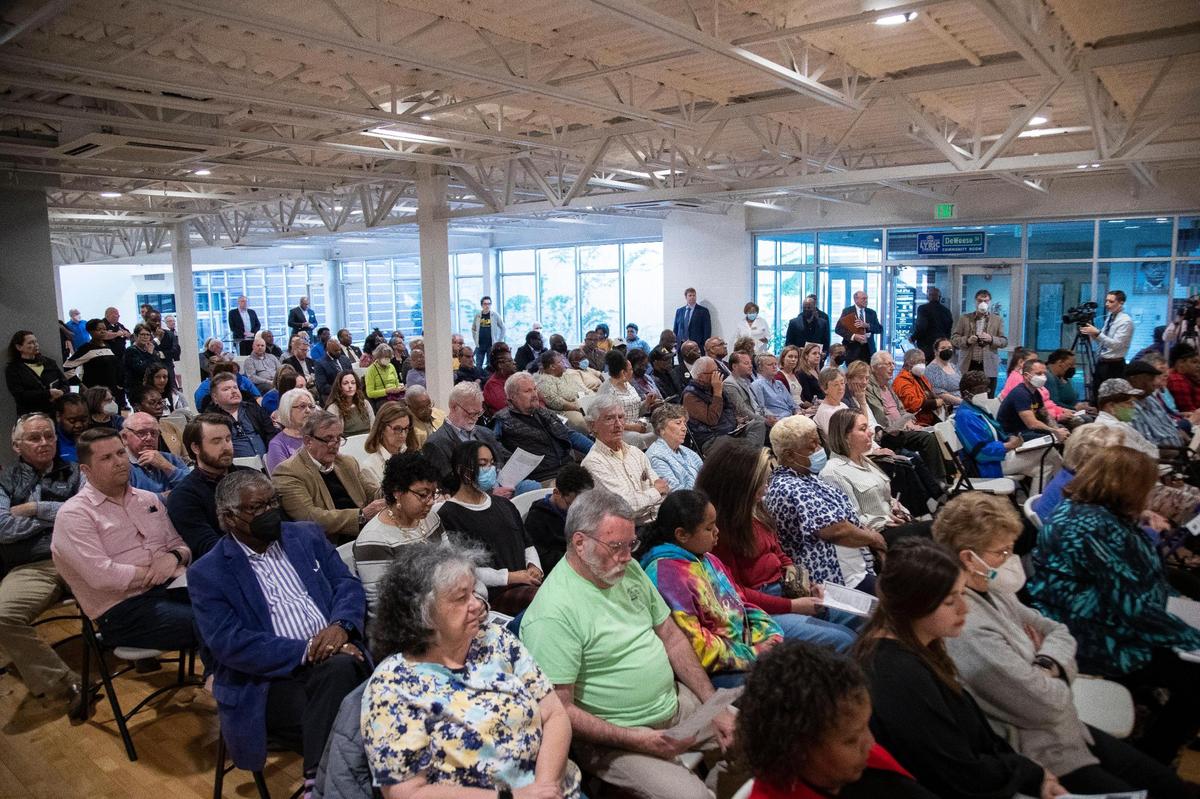People gather to hear mayoral and county attorney candidates answer prepared questions during a forum put on by six non-profits at the Lyric Theatre in Lexington, Ky., Thursday, April 21, 2022.